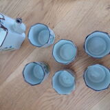 Service à thé en grès émaillé à décor de fleurs bleues, théière et six tasses