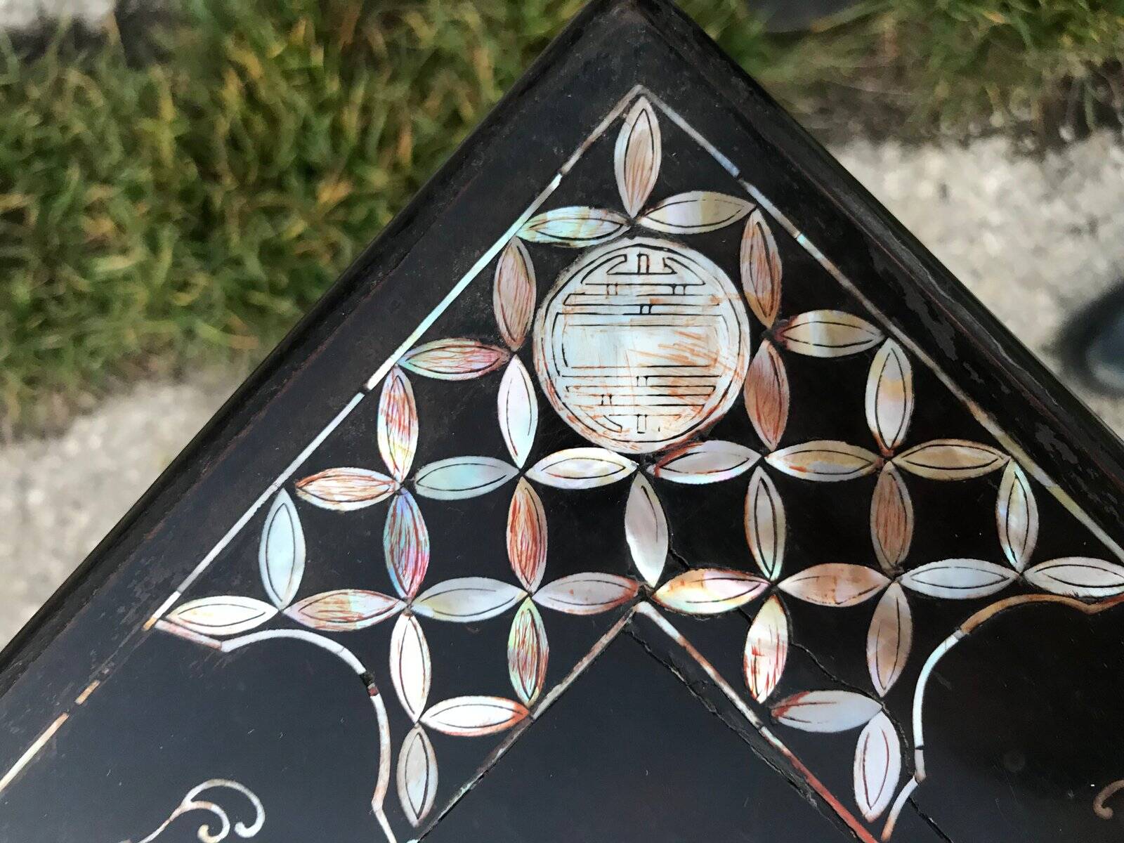 Chinese black lacquer side table with multicoloured inlays, 1950s.