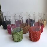 set of 9 small glasses with colored rattan support from the 70s