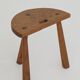 2 vintage solid wood half-moon tripod stools, circa 1950