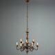 Antique wooden and brass chandelier with 9 lights, Italy, 20th century.