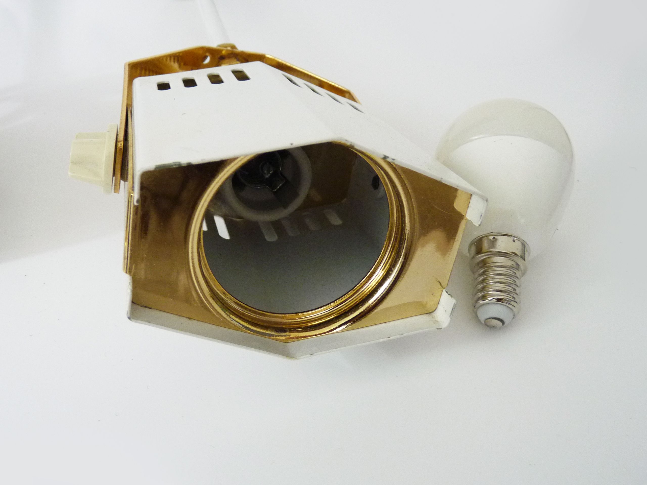 Pair of spot wall lamps adjustable design in white metal and brass. Year 80