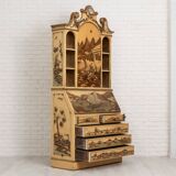 Desk with oriental motifs in relief