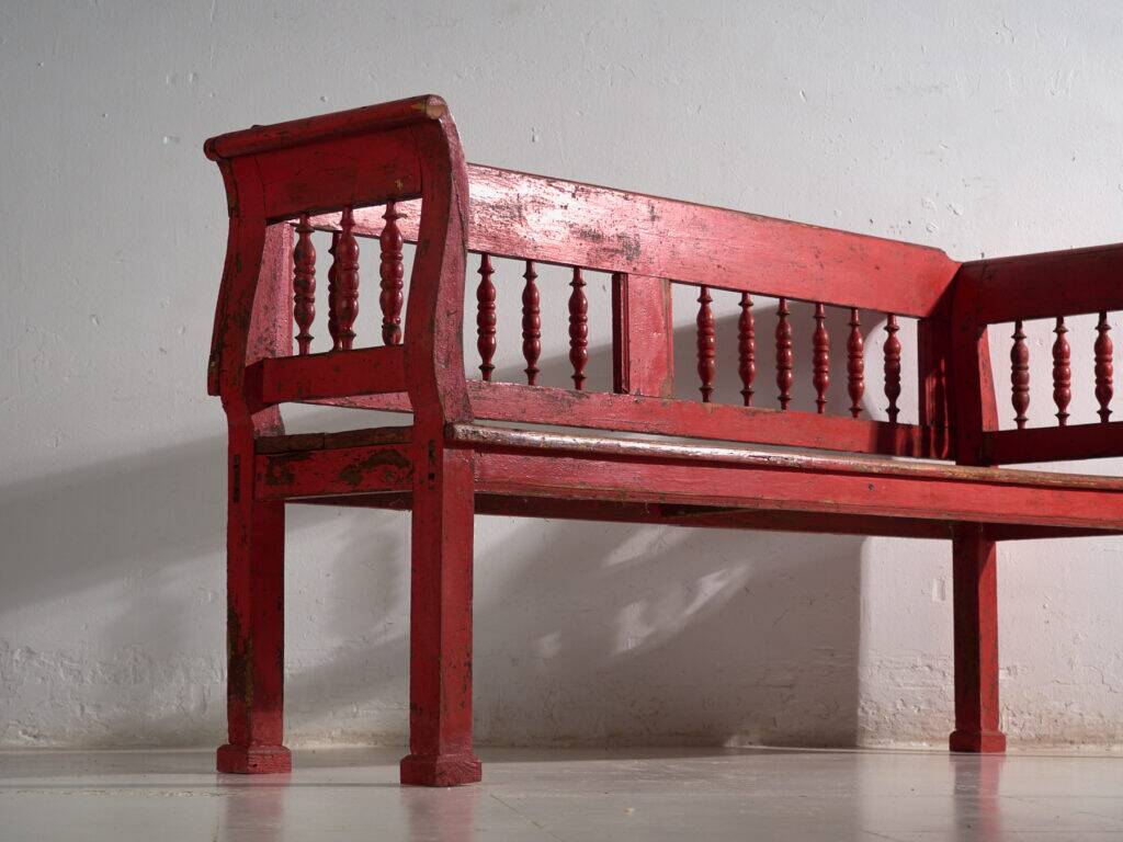 Old red-painted pine bench with turned backrest – Central Europe, circa 1900