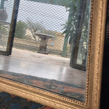 Old rectangular golden mirror baguette with beaded row