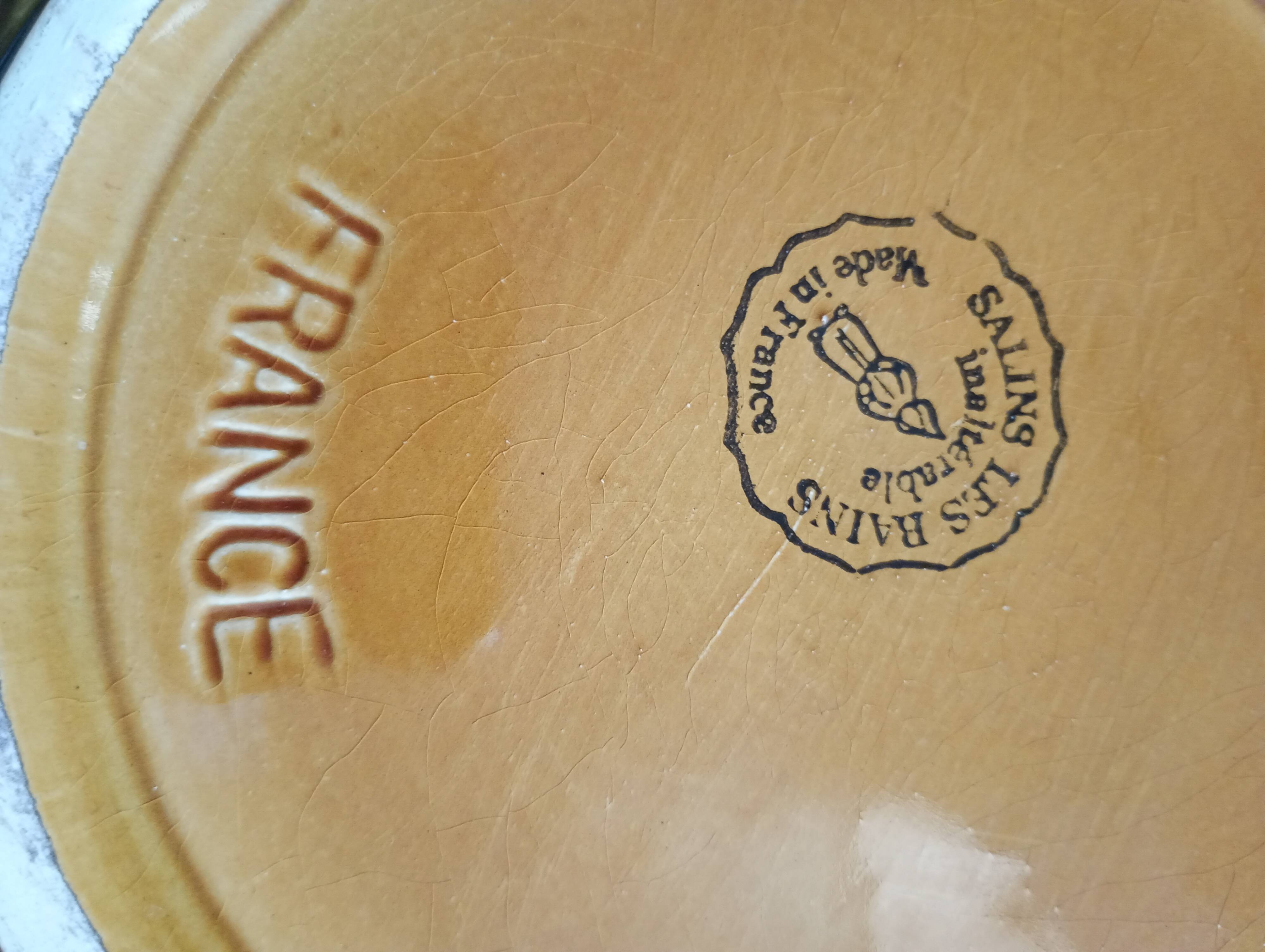 12 dessert plates and deep dishes from Salins-les-Bains, France.