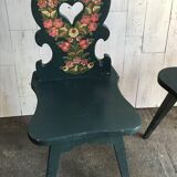 Set of 3 vintage wooden accent chairs painted navy blue, with 1920s decorated backs.