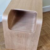 Boone coffee table in curved wood produced by Habitat, design
