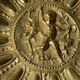 Footed fruit bowl in brass – relief mythological decoration – sty