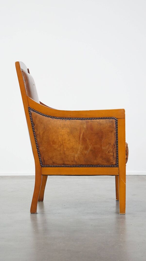 Fauteuil Art Déco en cuir de mouton marron et bois