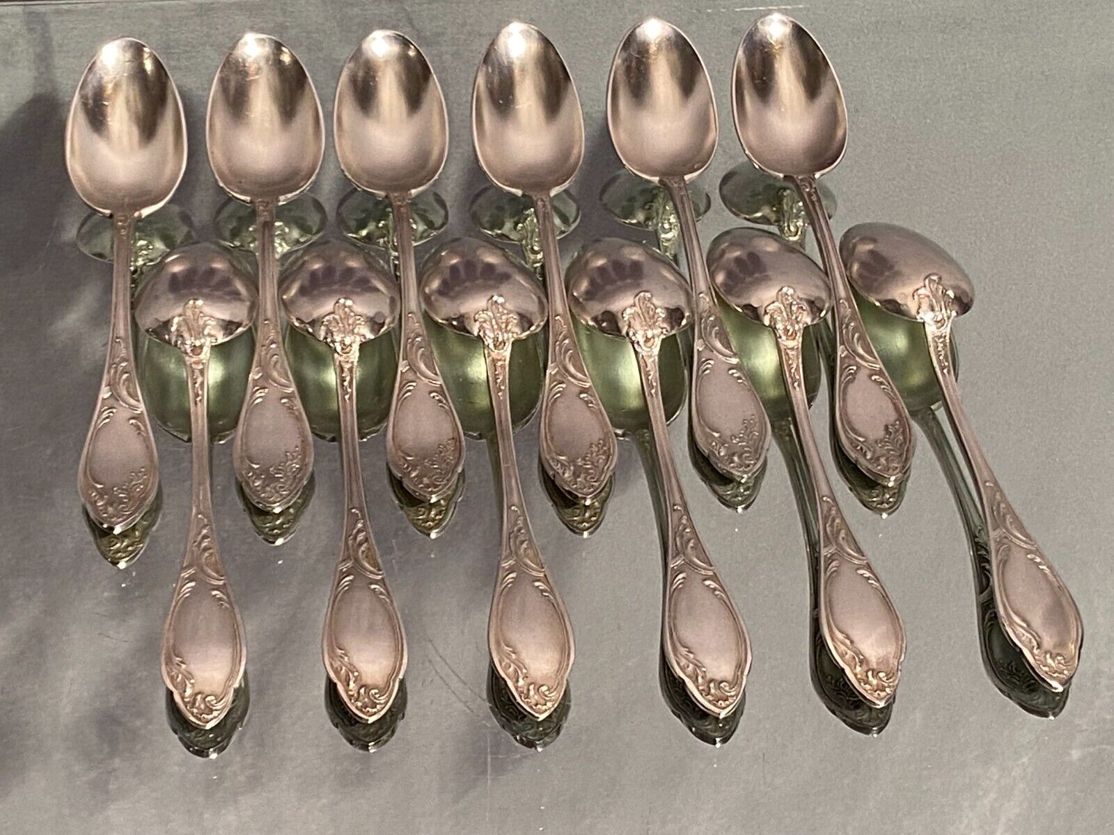 Suite of 12 small silver metal spoons in Louis XV style