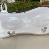 Enamelled sheet metal with inscriptions and hooks