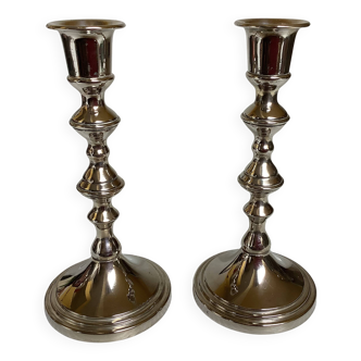 Pair of silver metal candlesticks
