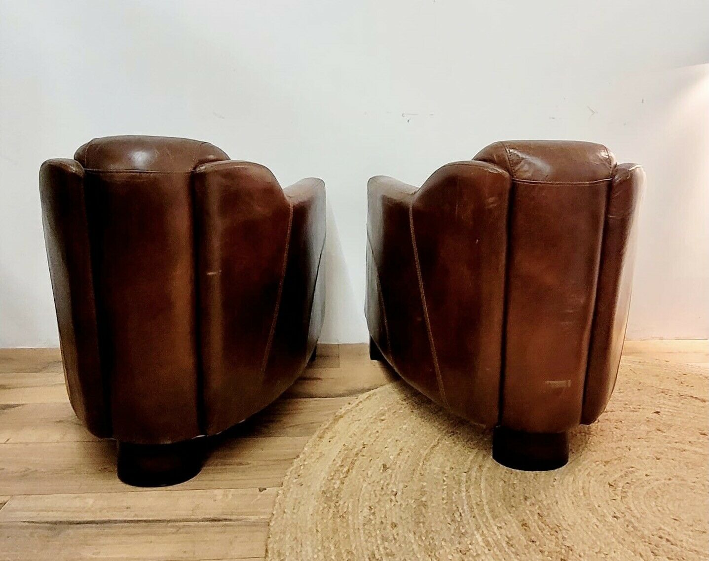 Pairs of vintage leather club armchairs