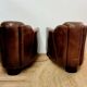 Pairs of vintage leather club armchairs