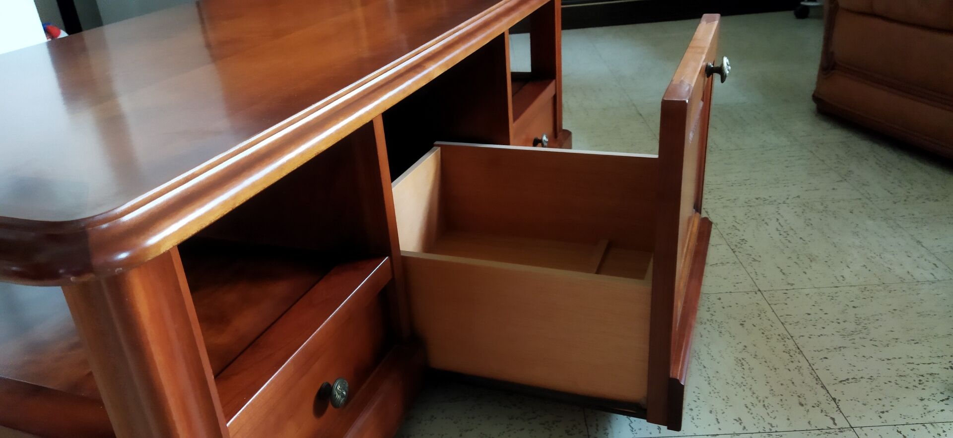 Louis Philippe style coffee table in cherry wood with large drawers.