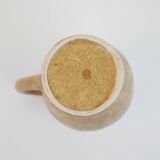 Small brown stoneware pitcher