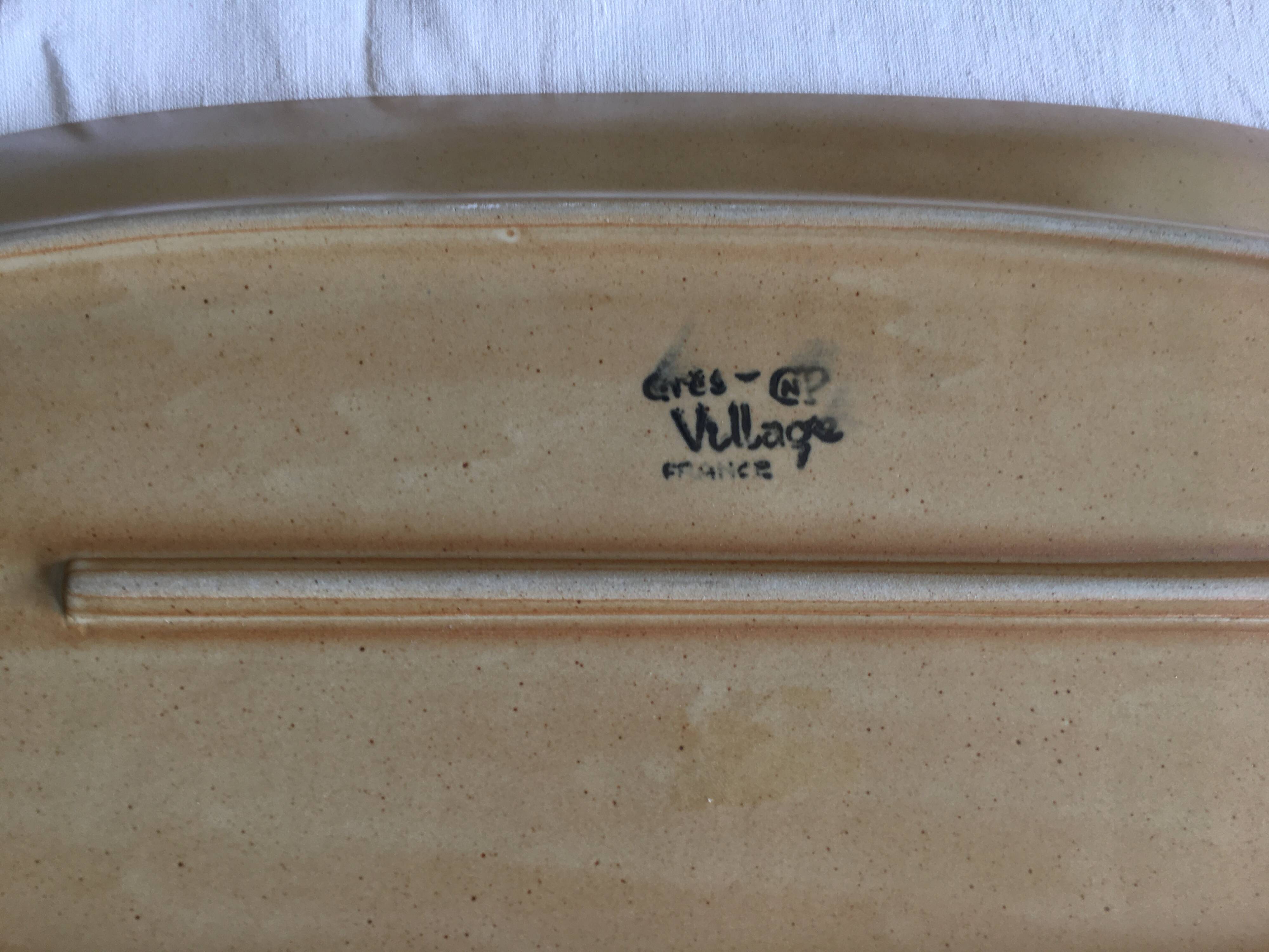 Very large fish dish stamped “Grès CNP Village France”