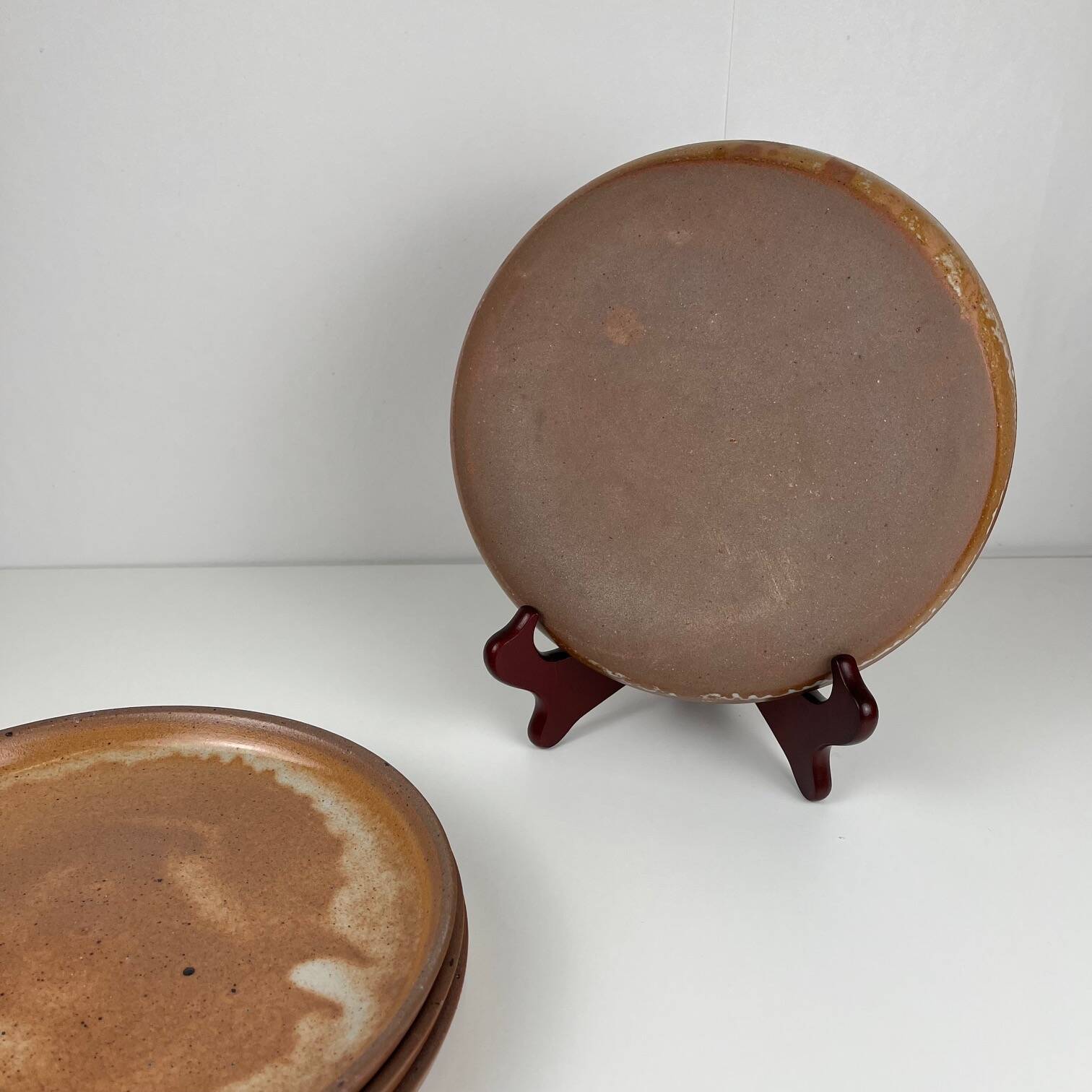 Set of 4 brutalist terracotta plates, brown/red tone, 1970