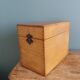 Wooden storage box, empty pocket
