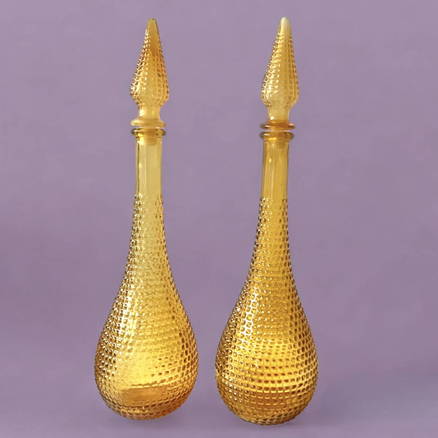 Pair of vintage amber yellow Empoli glass decanters