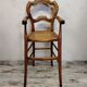 Children's high chair in wood and cane