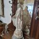 Garden statue of the Virgin Mary in old reconstituted stone