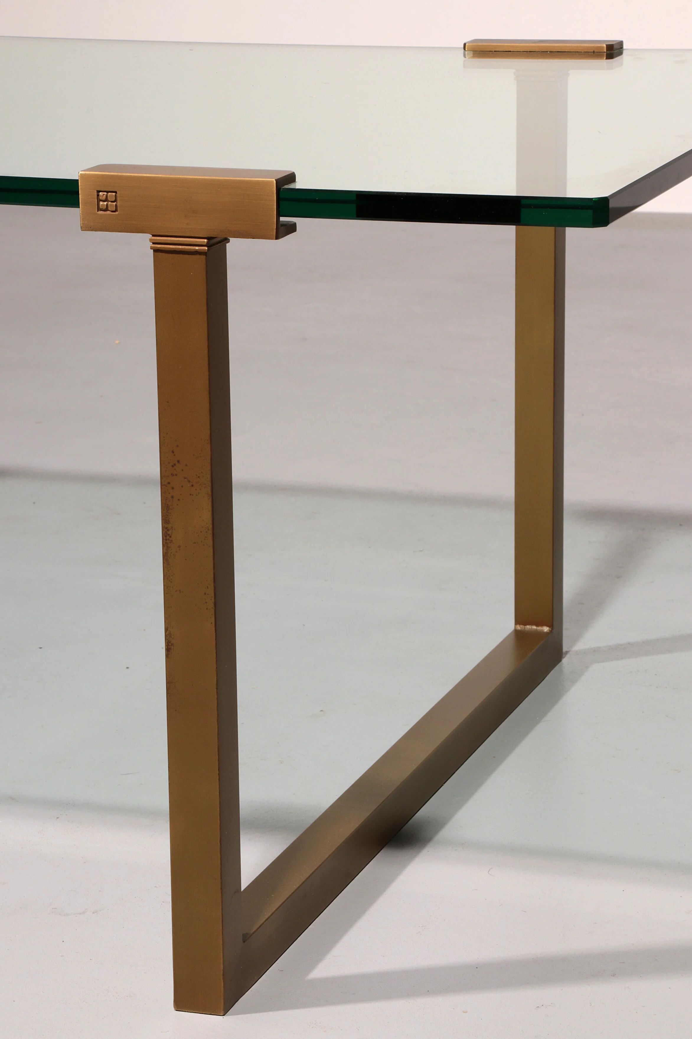 Coffee table glass and brass by Peter Ghyczy model T54 1970