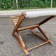 Folding rocking footrest in wood and white leather