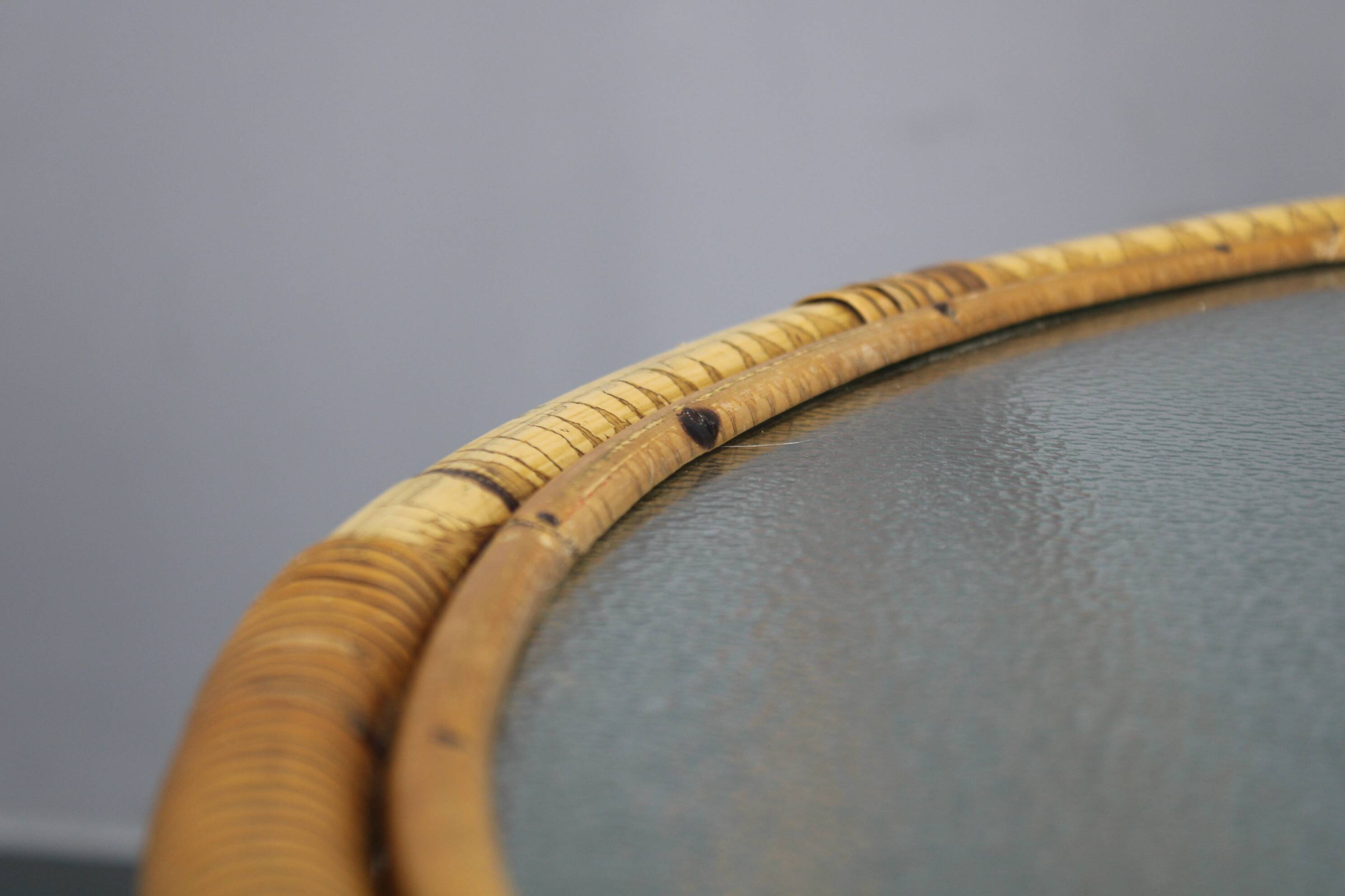1960s Italian rattan coffee table with glass top, mid-century round design