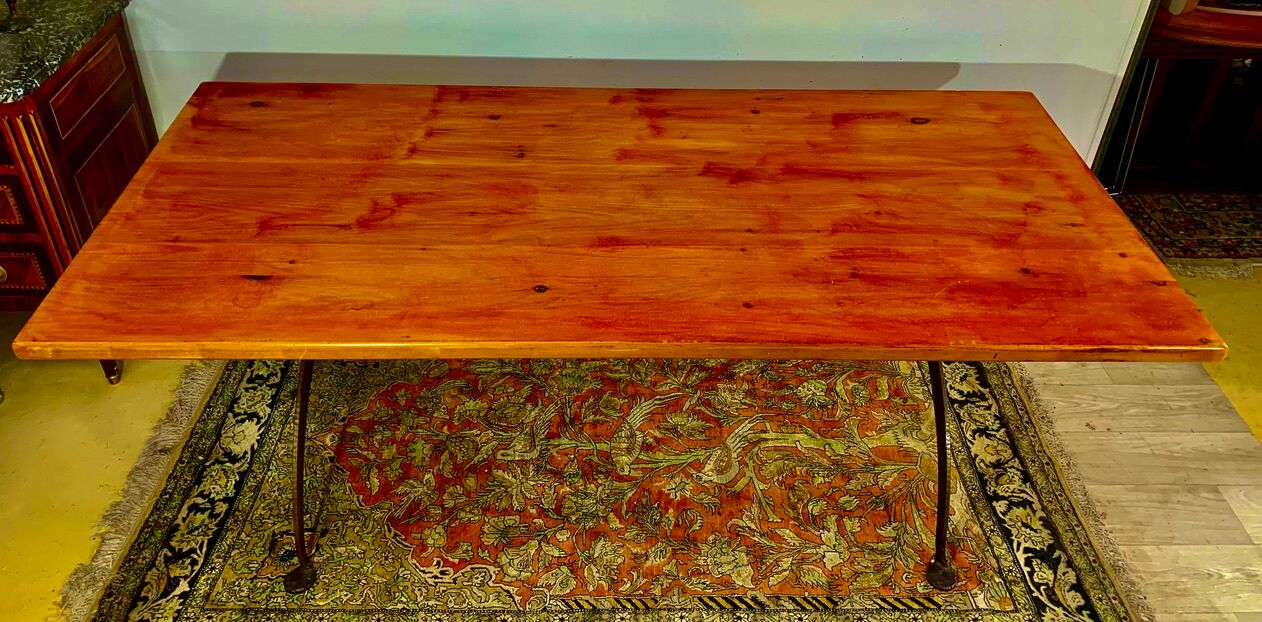 Rectangular wooden table, legs and spacer in hammered ironwork, 60s