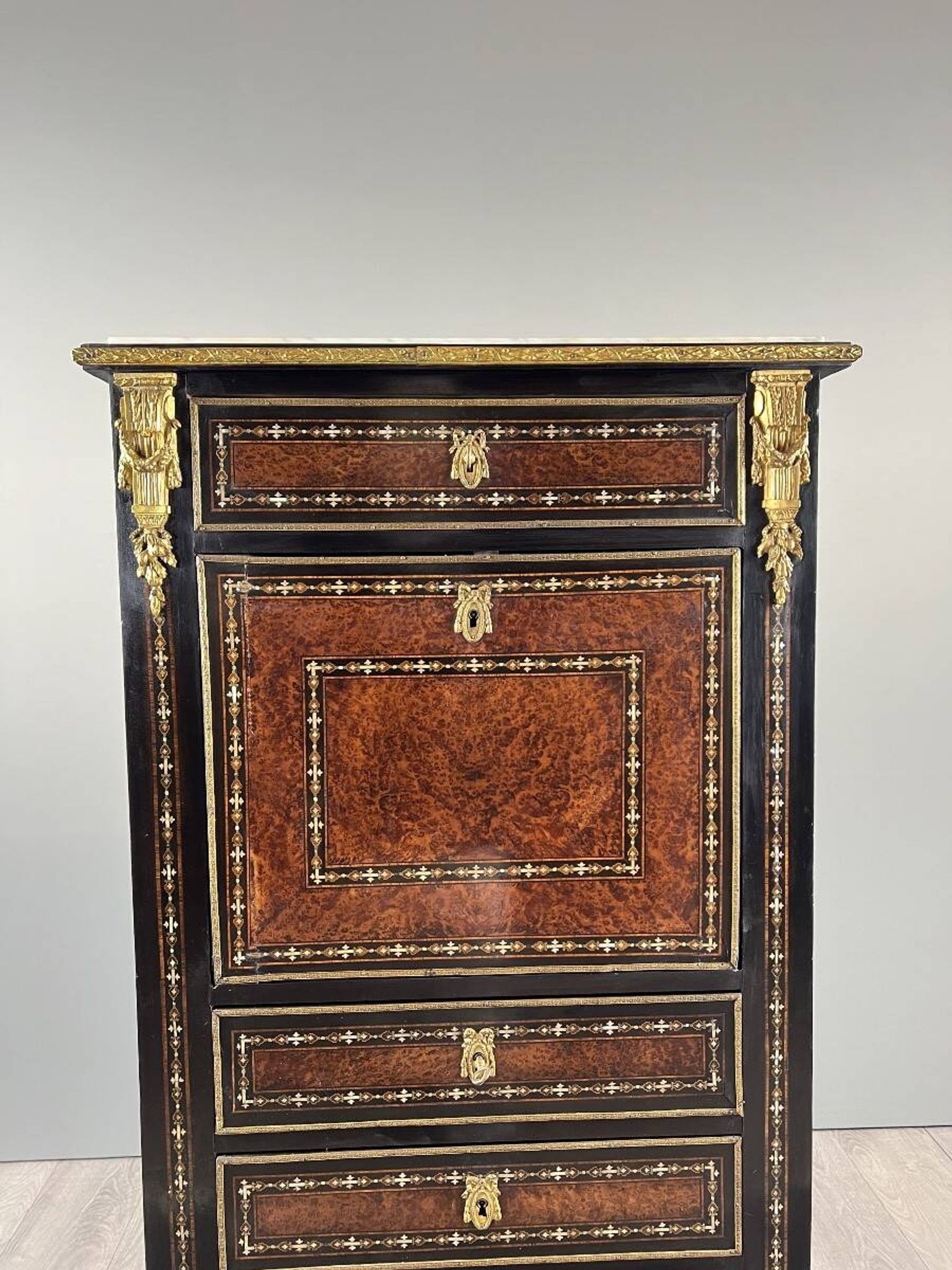 Secretary from the time of Napoleon III in marquetry and gilded bronzes, 19th century.