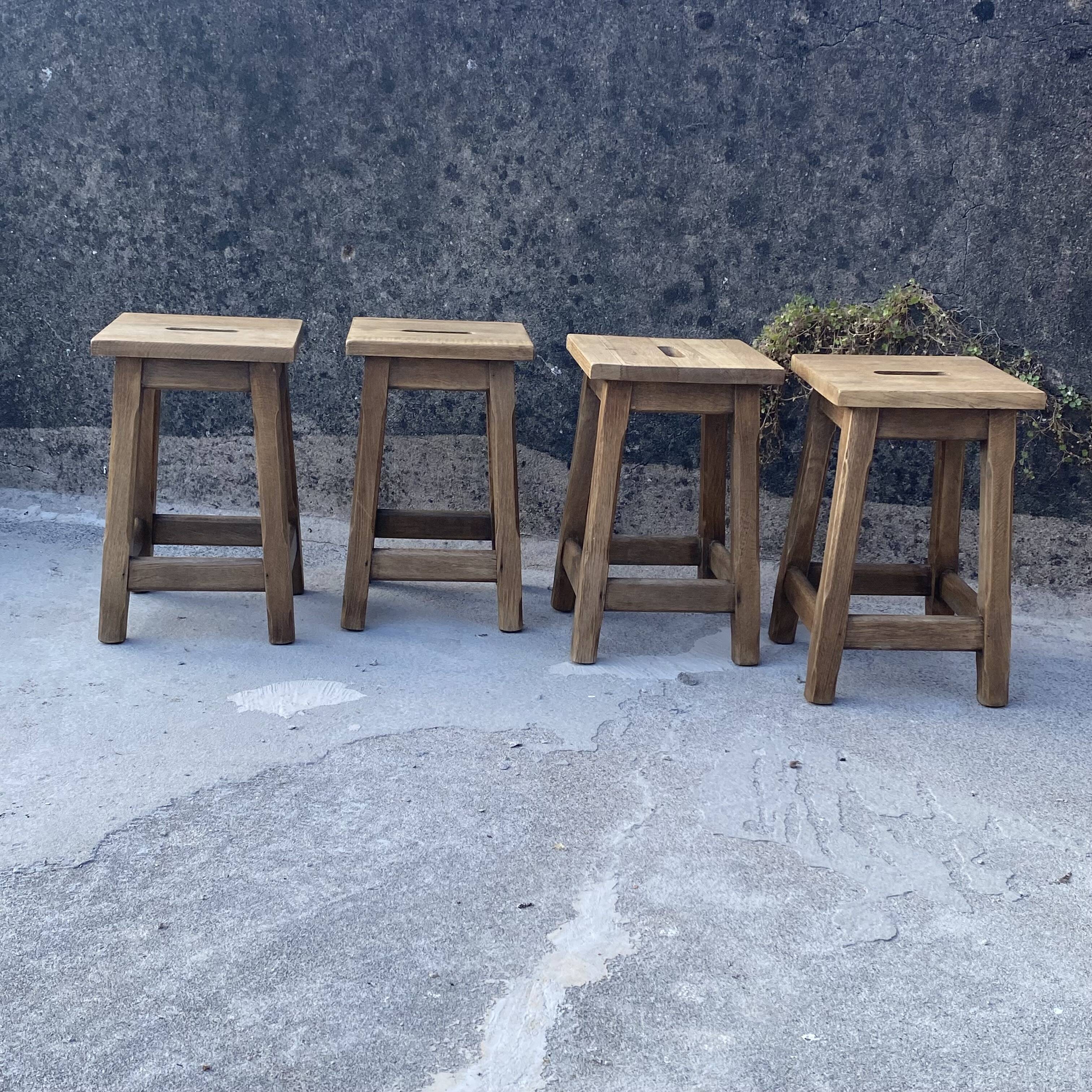 Set of 4 antique wooden farm stools