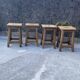 Set of 4 antique wooden farm stools
