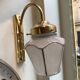 Pair of 1960 brass wall lamps and gilded frosted glass