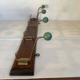 Old coat rack green balls wood metal