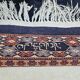 Tapis persan en laine nouée à la main