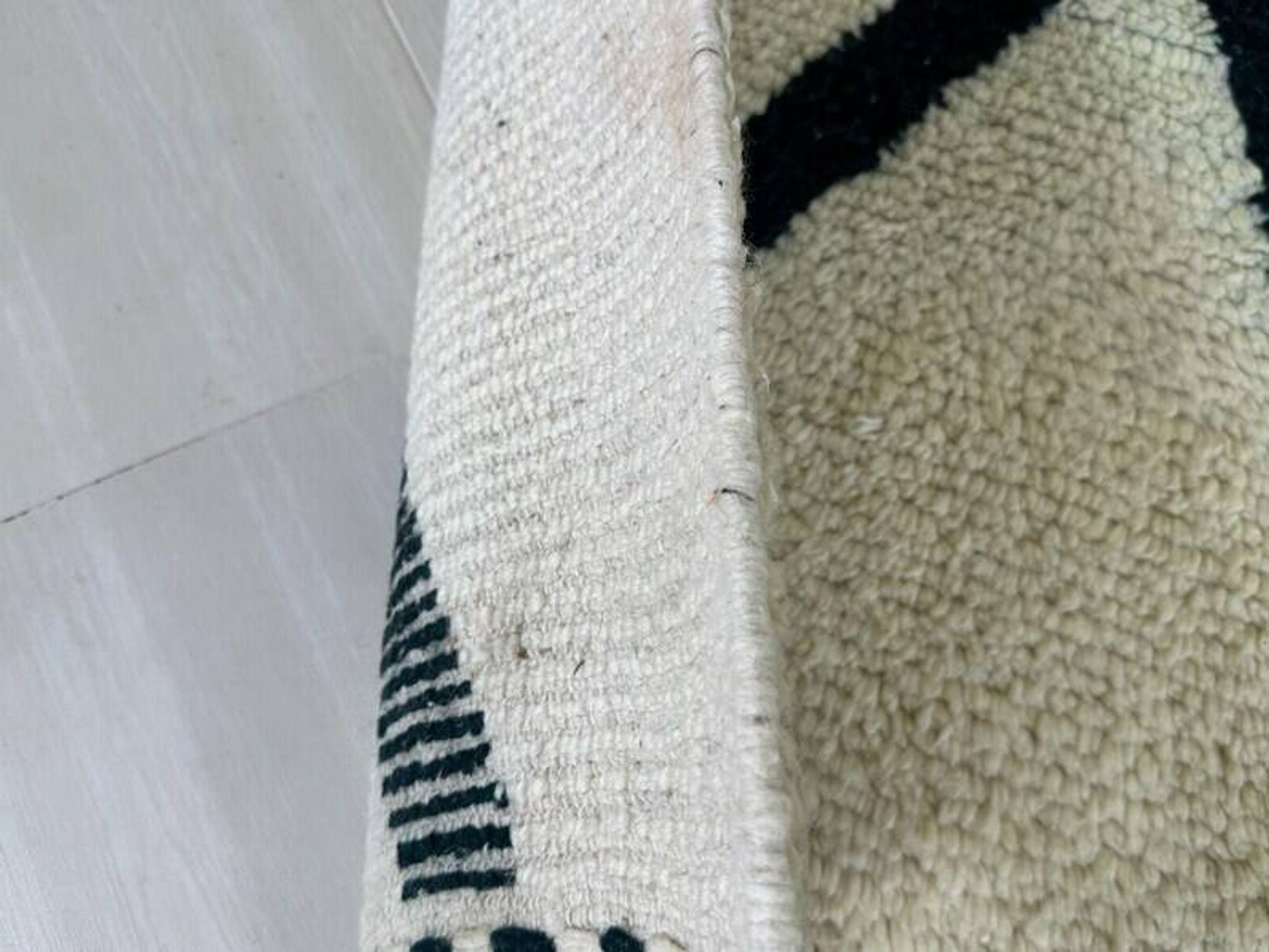 Handmade natural wool rug 250cm x 150cm