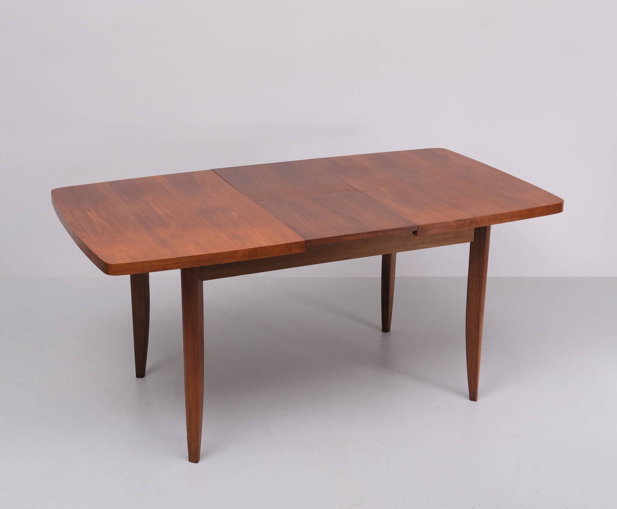Extendable dining table in walnut wood by Jindrich Halabala 1960