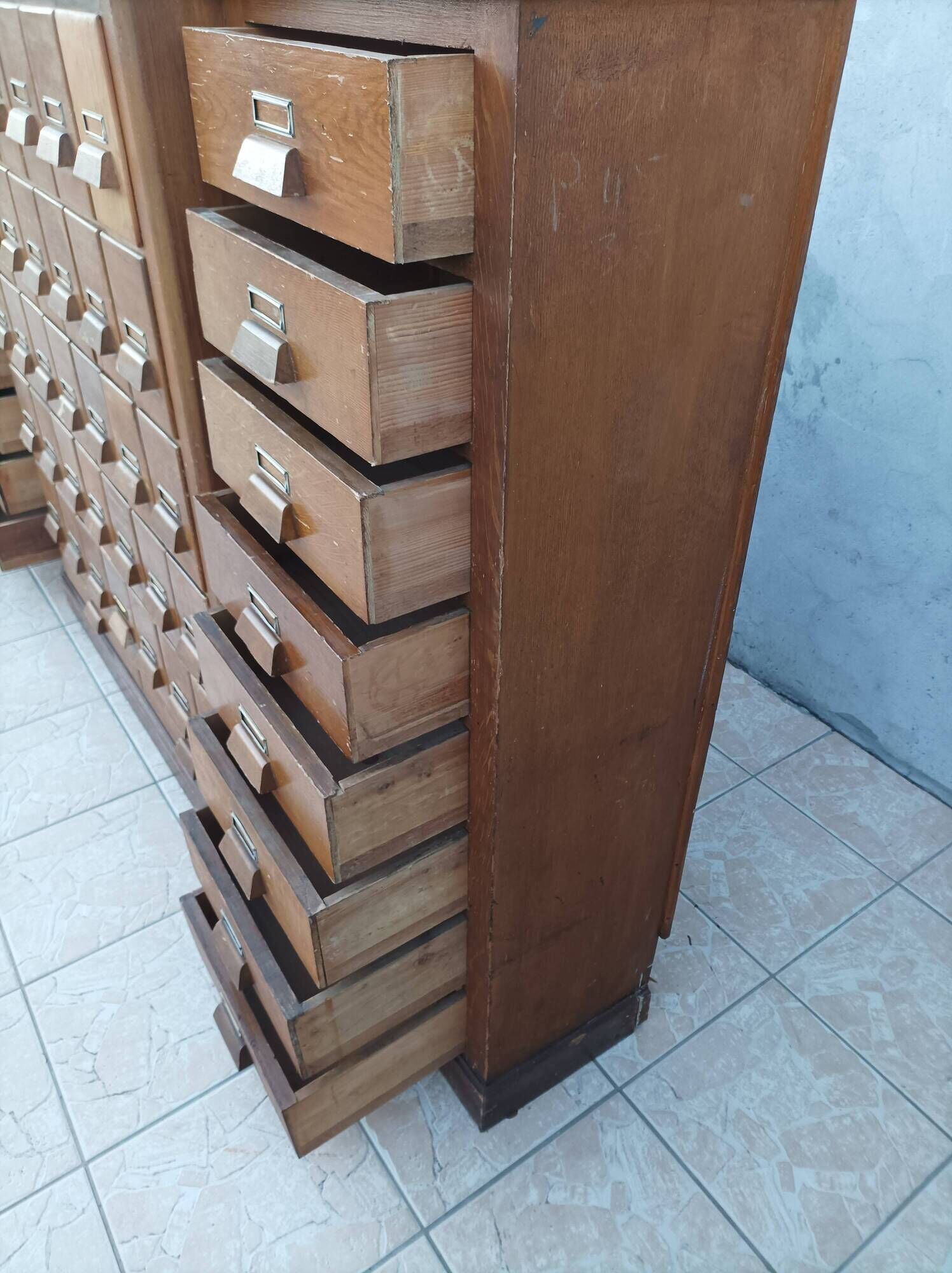 Apothecary or trade cabinet in fir with 53 drawers.