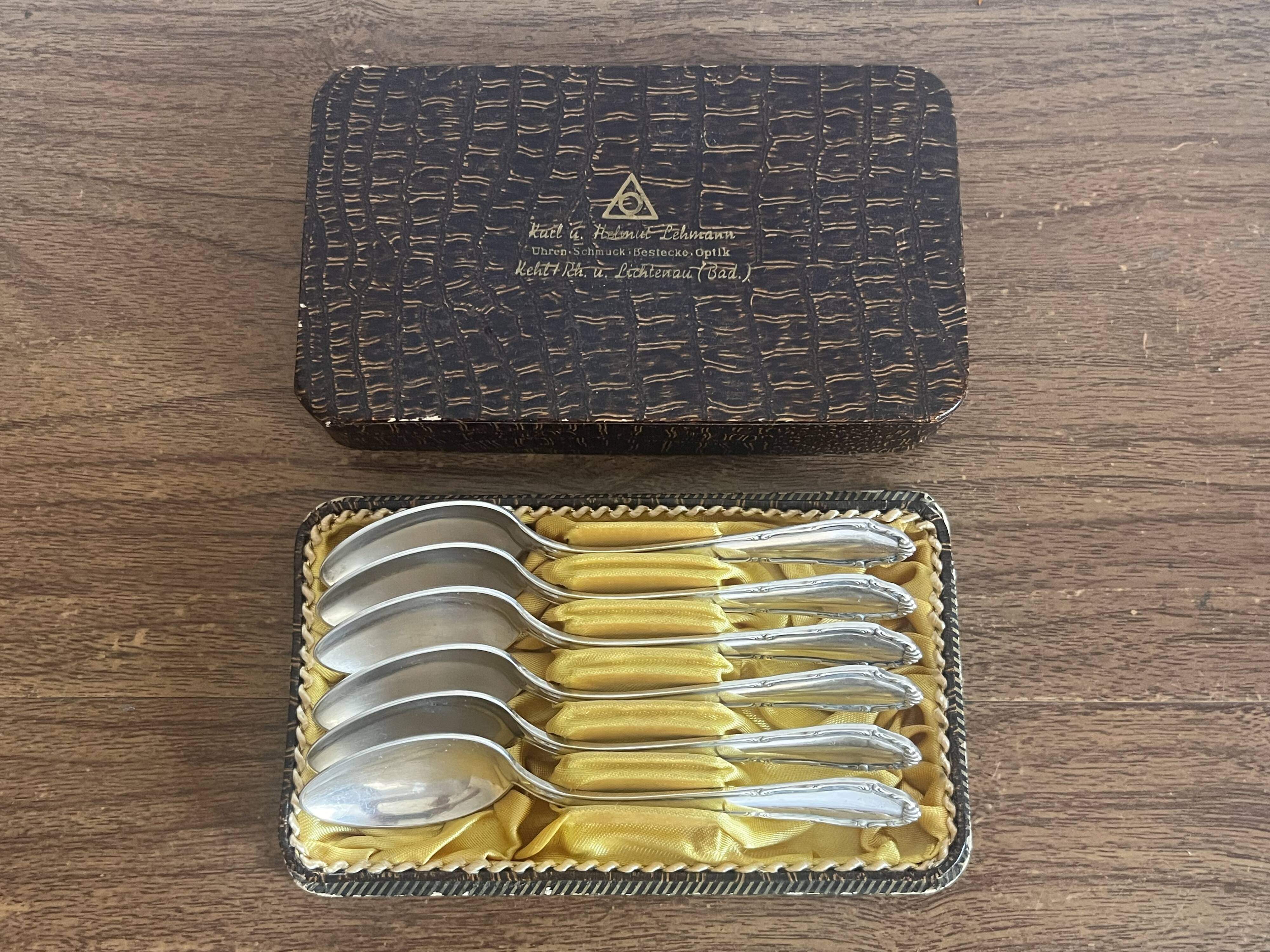 Small silver-plated metal spoons