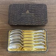 Small silver-plated metal spoons