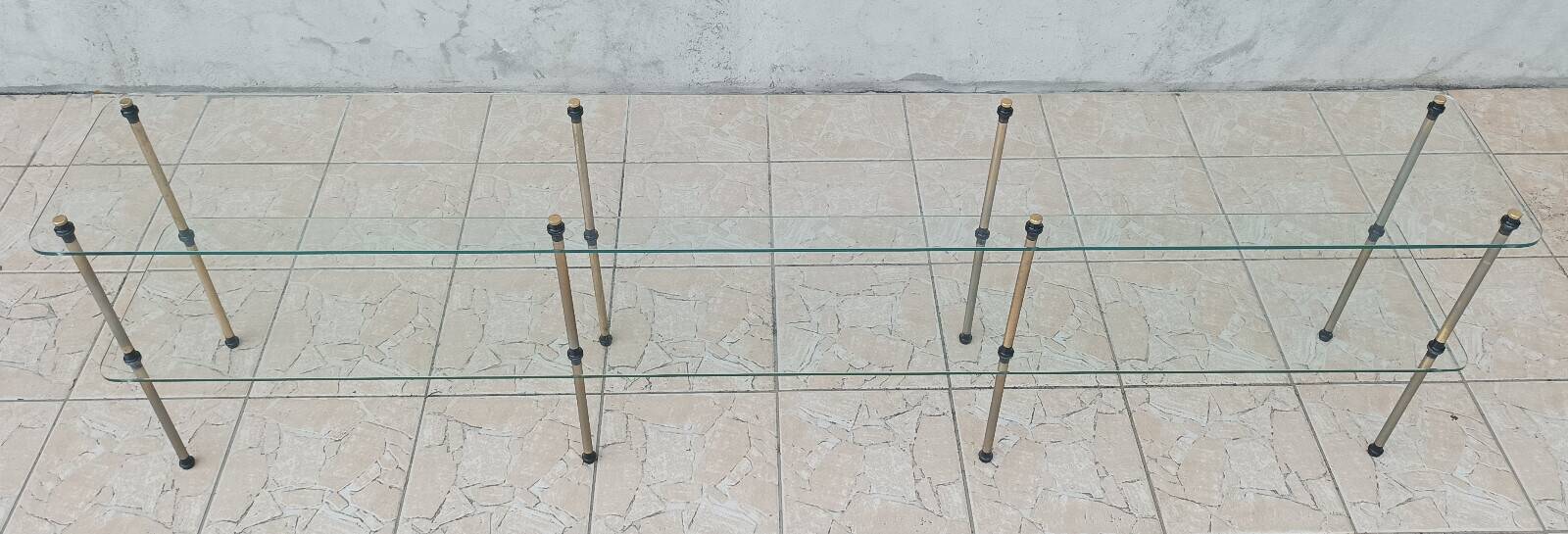 Large vintage metal and glass shop display shelf.