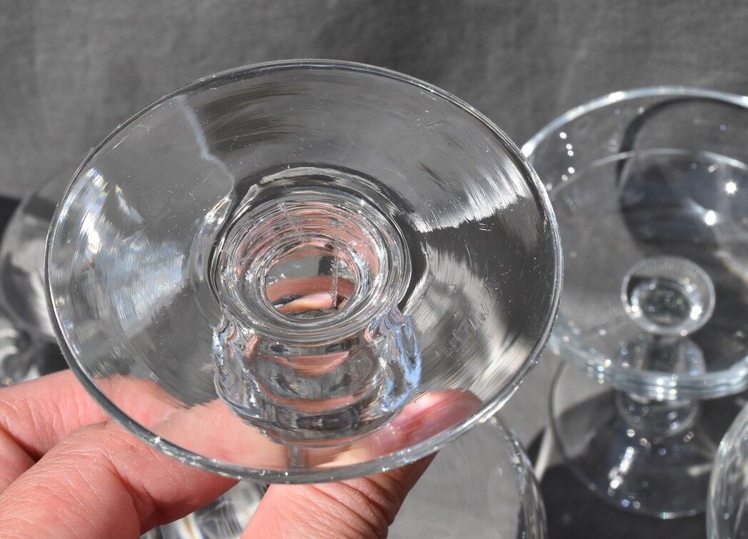 9 old champagne glasses in flat-waisted blown glass