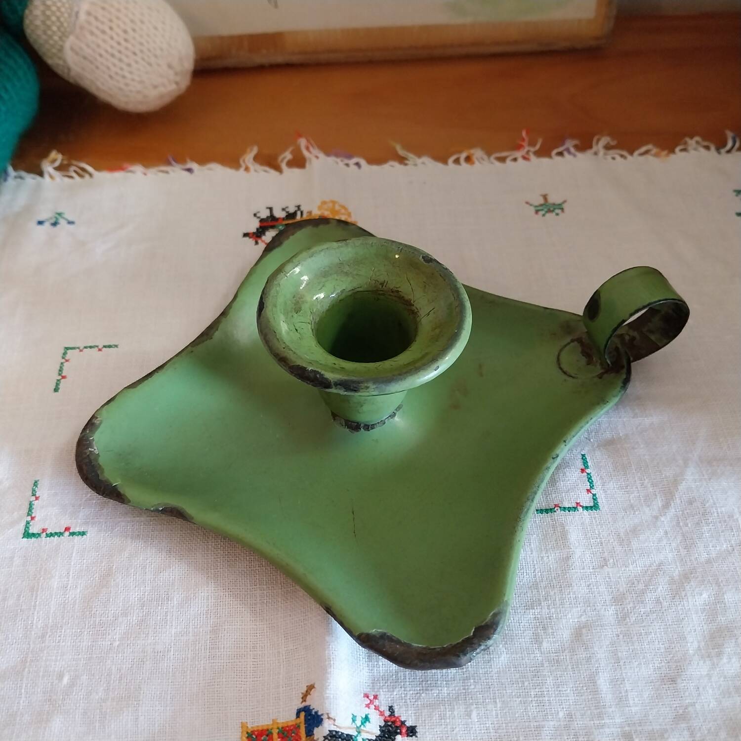 Old enamelled metal cellar rat candle holder