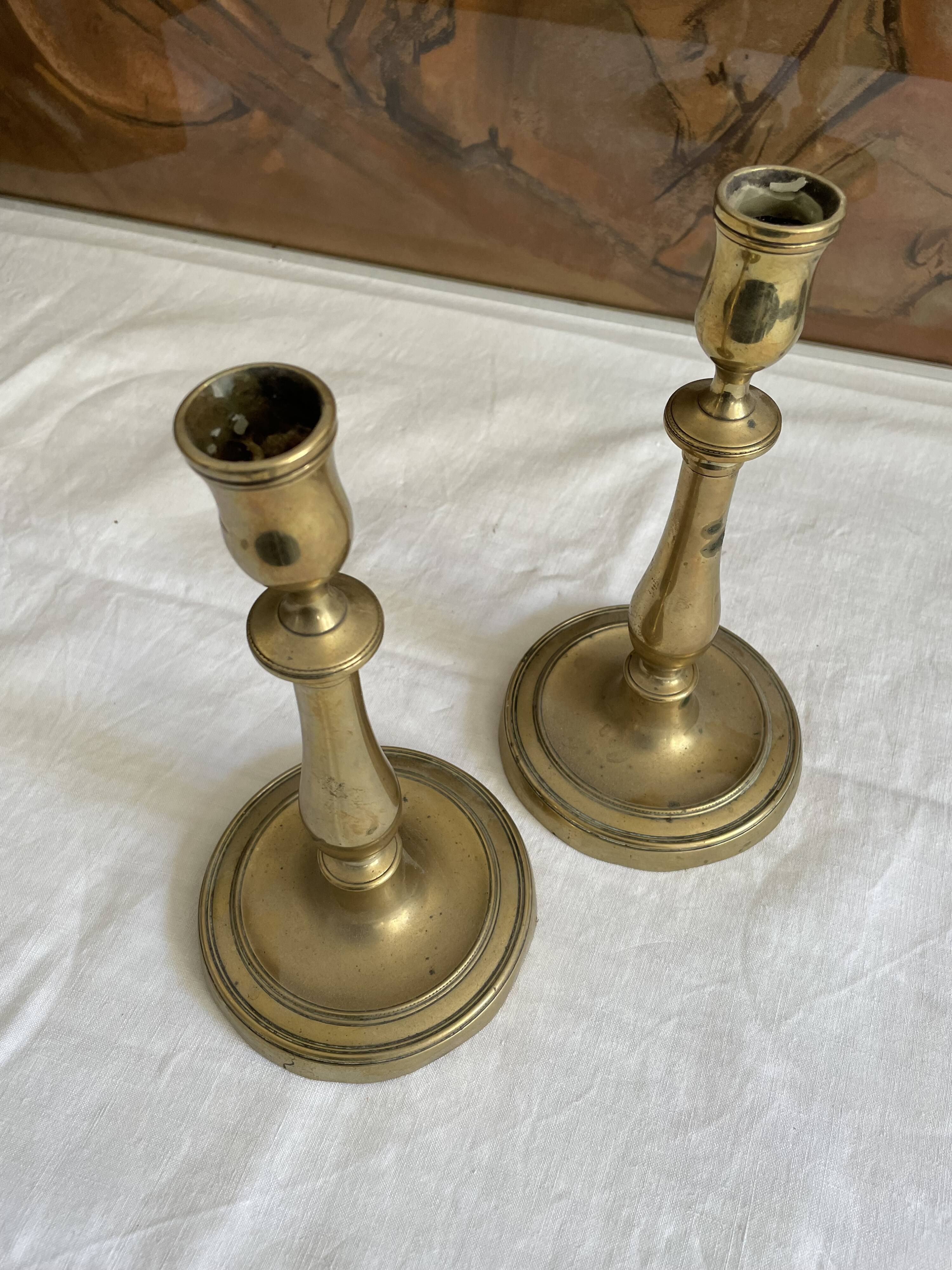 Pair of brass candle holders
