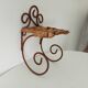 Antique wrought iron wall shelf
