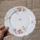 Porcelain plate with floral decoration, gilding, and relief MR France 25.5cm