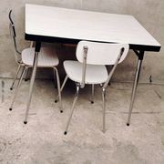 Table and 2 chairs set made of Formica.