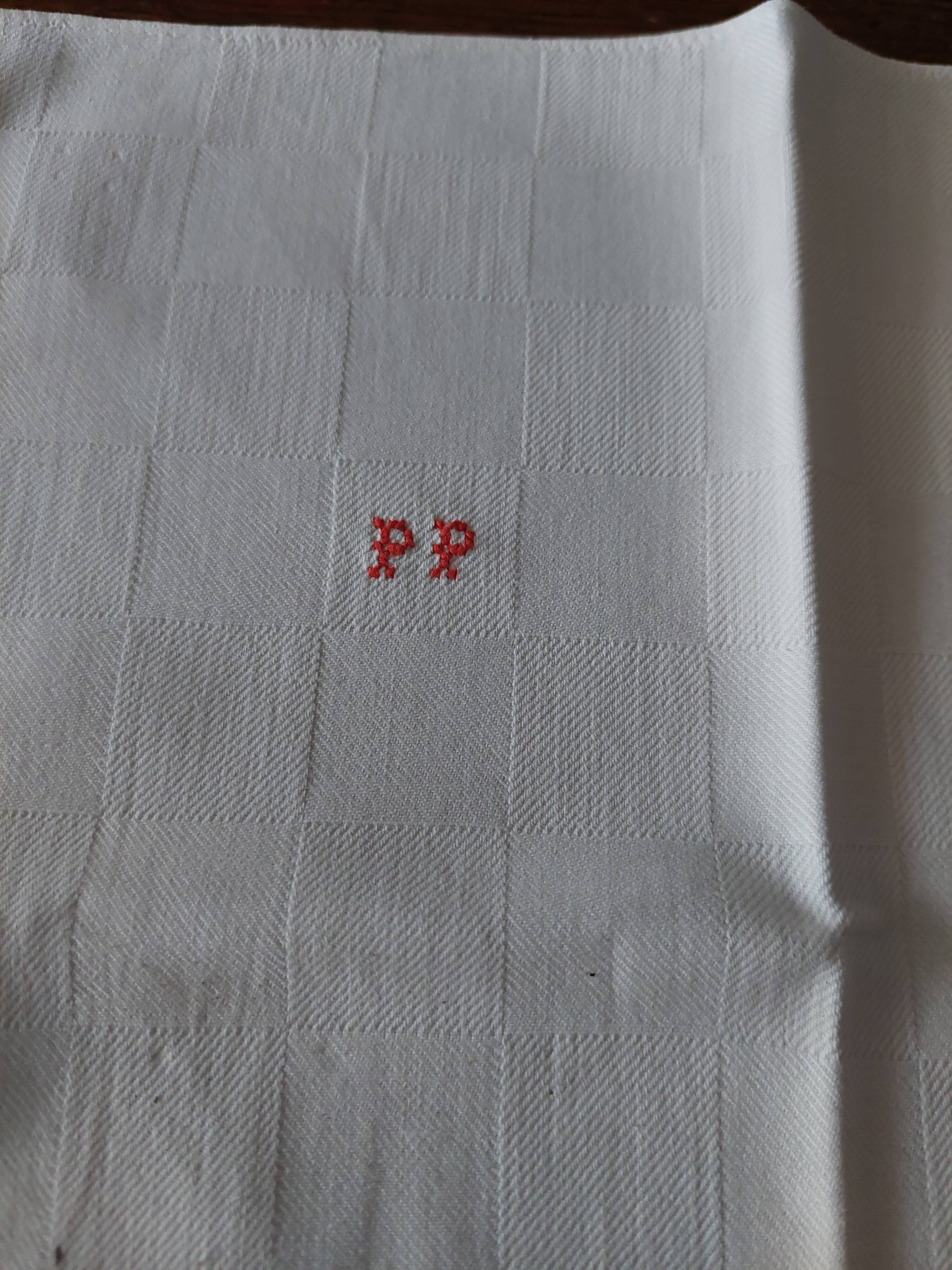 Set of seven monogram PP damask cotton napkins 56 x 56 cm